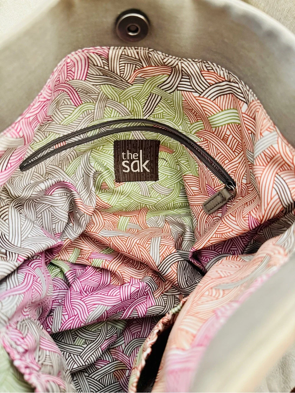 The Sak Neutral Beige Crossbody Bag with Brown Leather Strap